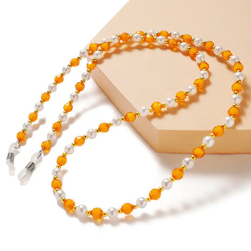 A chain for glasses beads an orange pendant - Other cell phone equipment<<<HurtelXML