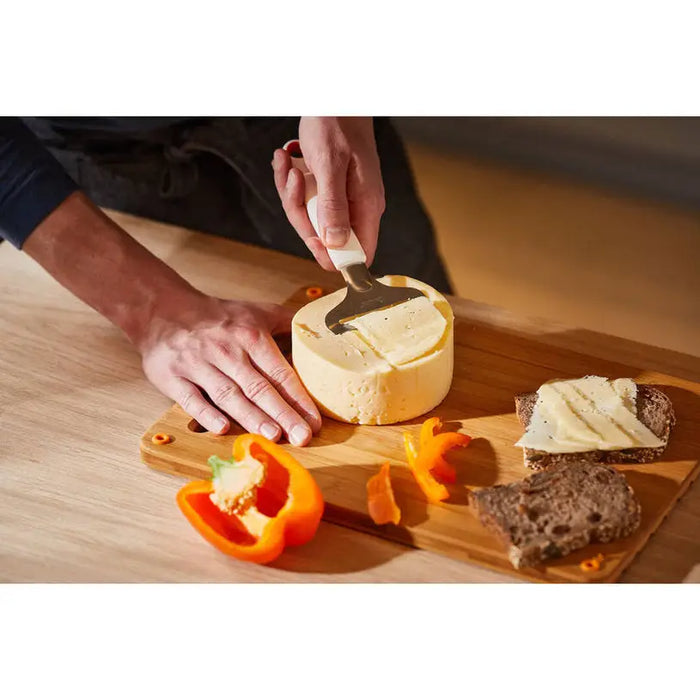 FISKARS FUNCTIONAL FORM SOFT CHEESE KNIFE - Дъски ножове и белачки<<<Домашни потреби<<<Кухня<<<Praktiker