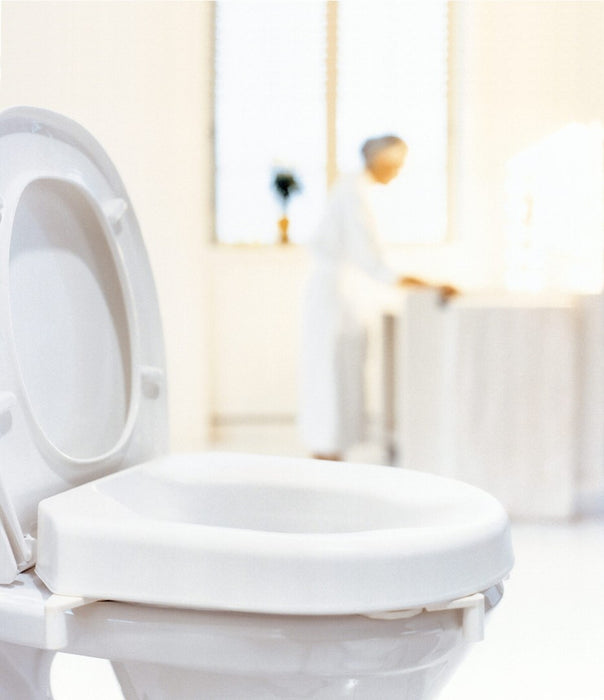 Toilet seat elevation cap with flap Etac HI-Loo 10 cm